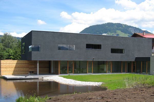 Holzhaus mit Putz-Fassade